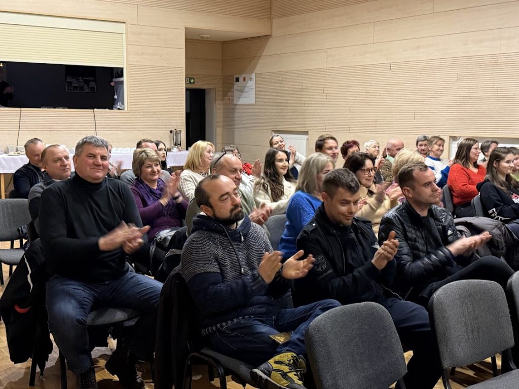 zdjęcie przedstawia spotkanie autorskie z Michałem Tylką